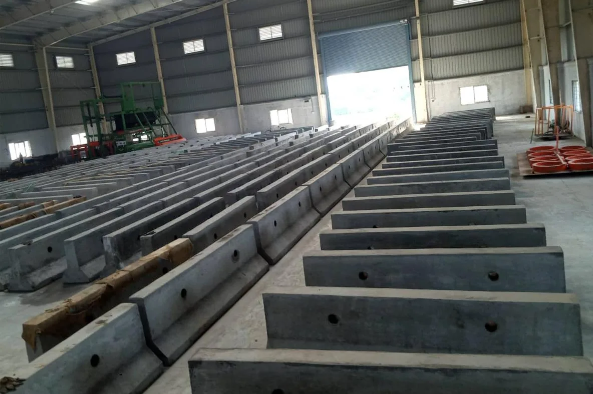Rows of precast concrete Jersey barriers at the precast facility