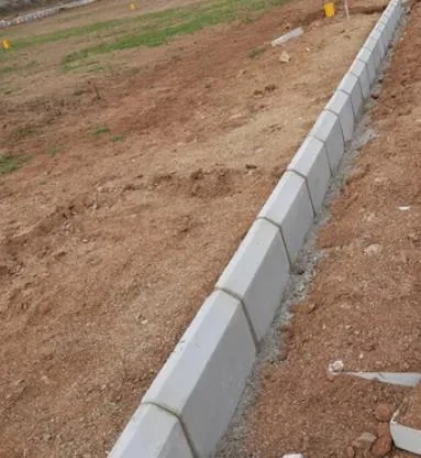 Kerb Stones & Saucer Drains pictured in the Precast Profile